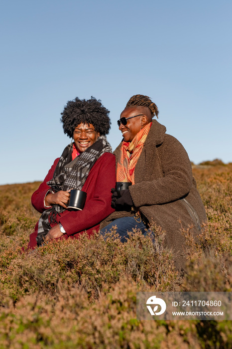 Two senior women in nature