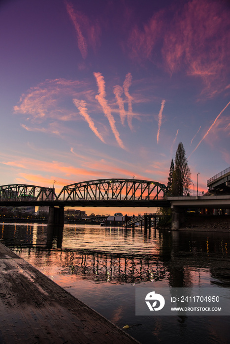 Reflective sunset over bridge in Portland Oregon