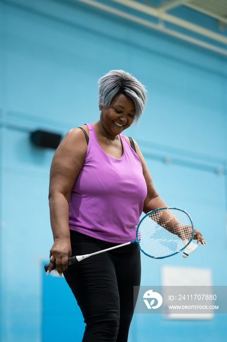 Woman playing badminton