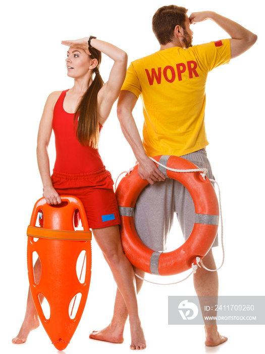 Lifeguards with rescue and ring buoy lifebuoy.