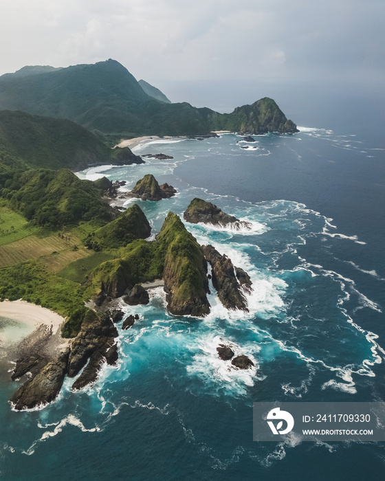 Amazing Lombok island mountain coastline aerial drone view from above. Near Selong Belanak, Mawi and Semeti beach.