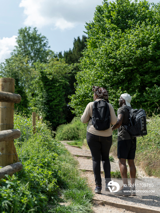 Mature couple hiking in summer