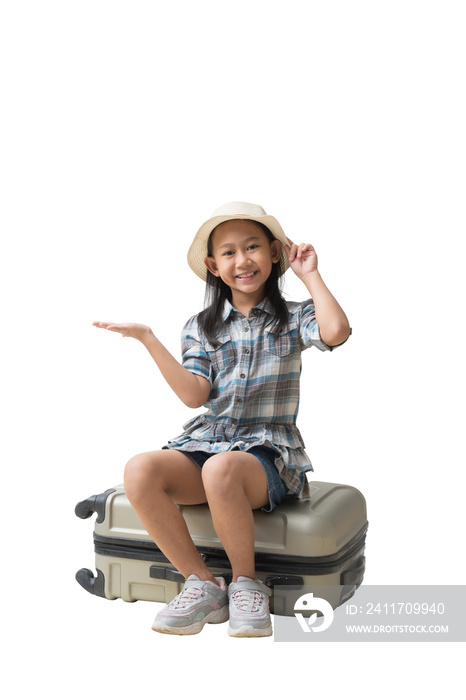 Pretty asian little girl sits on a suitcase with hand holding open palm up blank space, Adventure vacation travel trip dream concept. isolated background