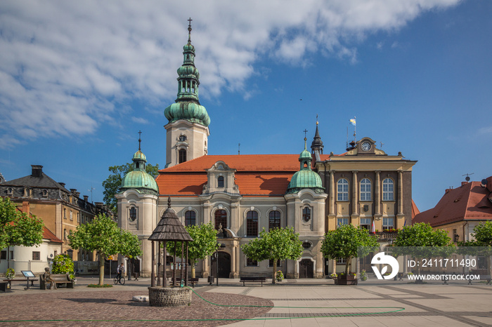 Church and town hall in Pszczyna, Silesia, Poland