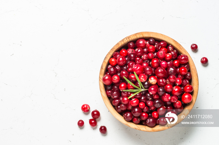 Cranberry in the bowl on white background.