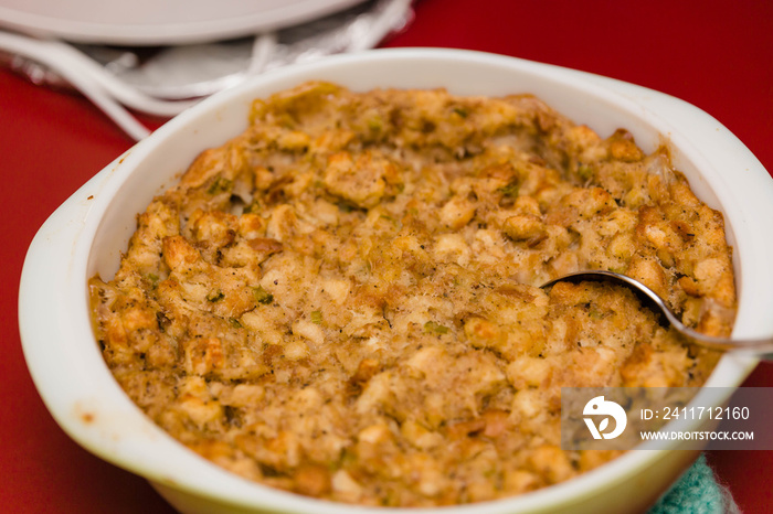 a bread dressing casserole is ready for a holiday meal