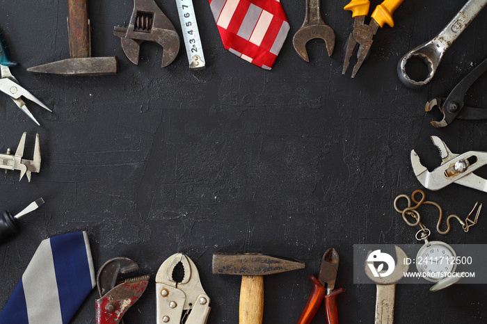 Top view design concept of Father’s day and labor day with working tools on blue background.