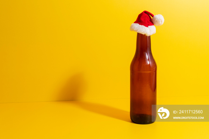 Beer bottle with christmas hat depicted the holidays.