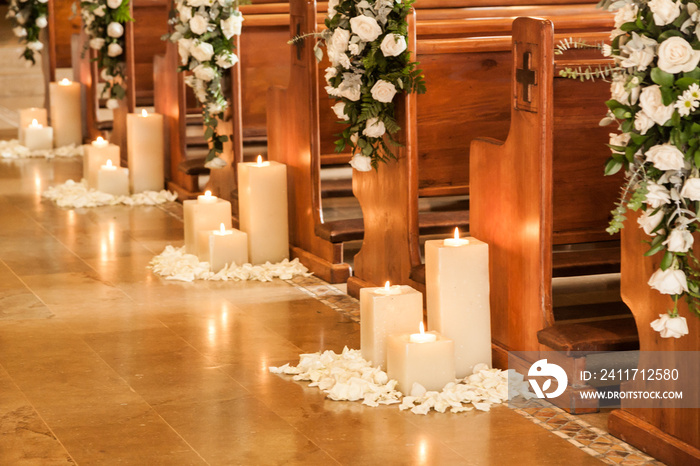 Catholic temple decorated with flowers and candles for wedding