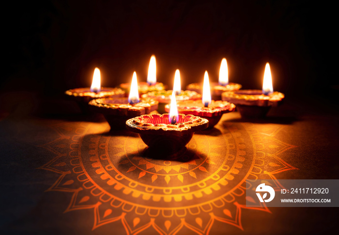 Diwali, Deepavali Hindu festival of lights. Diya lamp lit on black, copy space