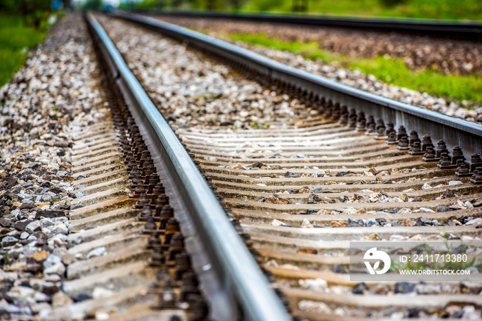 Railroad track rails in coutry landspace