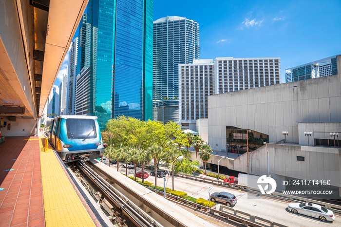 Miami downtown skyline and futuristic mover train view