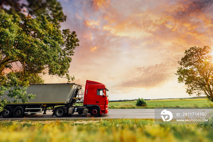 Lorry Truck in motion on a motorway during a heavy transport