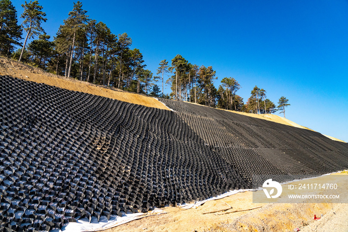 Metal mesh to strengthen the slope of the road