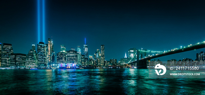 Manhattan skyline at night seen from Brooklyn. Tribute in Light