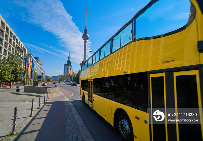 Berlin yellow tourist bus near Berliner Dom