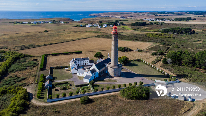 Aerial view of the Goulphar lighthouse on the island of Belle-île-en-mer in Morbihan, France - The tallest lighthouse on the biggest island of Brittany is adorned with a red metallic dome