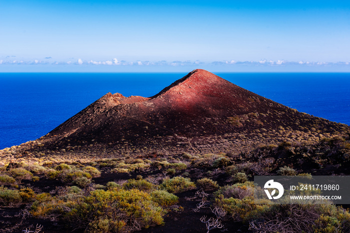 Mountain of Lagi, a volcano cinder cone in the Island of La Palma, one of the Canary Islands, in the Cumbre Vieja volcano area near Teneguia volcano. Windmill farm