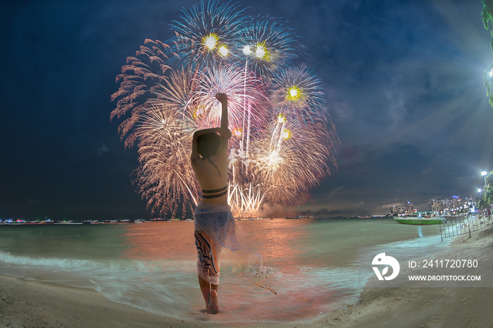 fireworks festival celebration on the sea beach beach of the bay, enjoy and exciting by the woman tourist in bikini