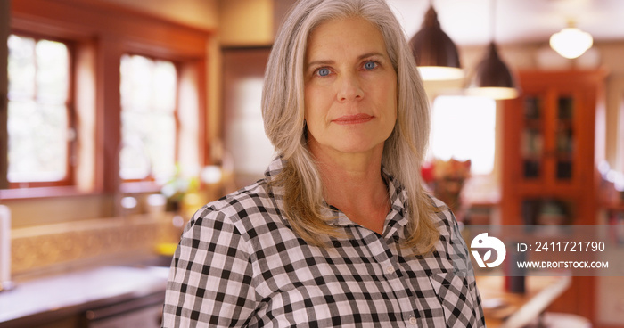 Portrait of a lovely mid aged woman looking somber