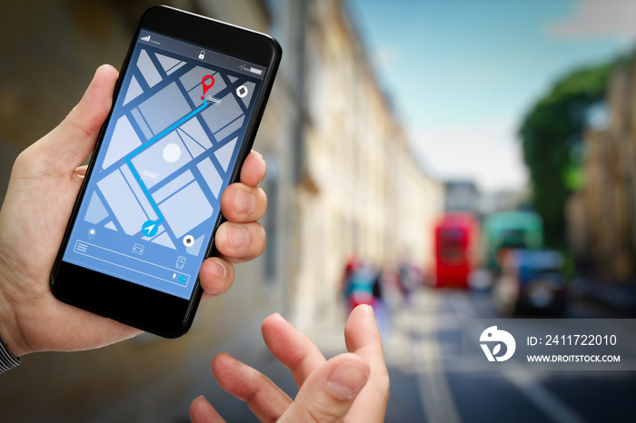 Close up of Tourist using GPS map navigation on smartphone application screen for direction to destination address in the city with travel and technology concept.