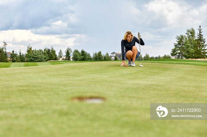 Goal concept, copy space. Women golfing time holding golf equipment on green field background. The pursuit of excellence, personal craftsmanship, royal sport, sports banner.