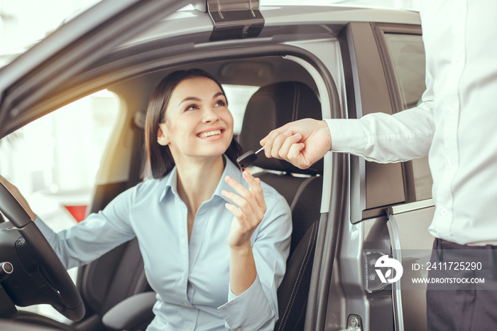 Young Woman in a Car Rental Service Test Drive Concept