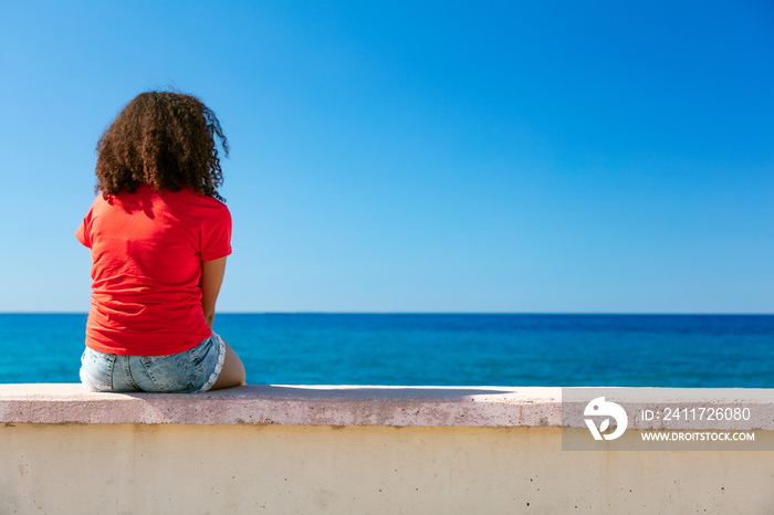 Young Woman Girl Teenager Sitting Wall Looking to Sea