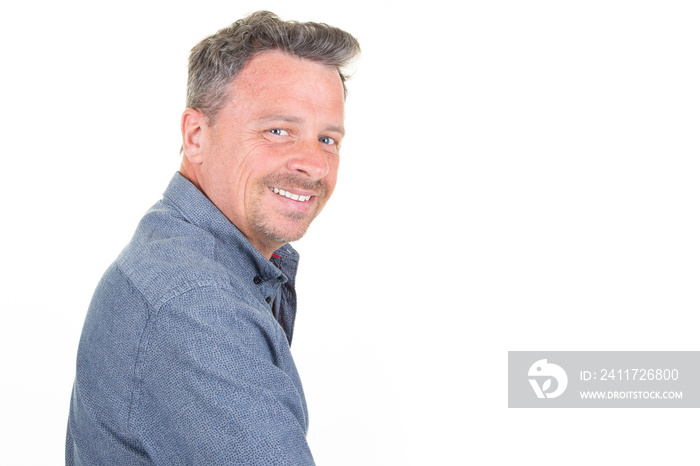 side profile studio Shot Of Middle aged Man Against White Background Smiling At Camera aside empty blank copy space