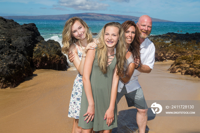 Happy Family together at the beach