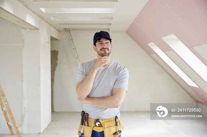 Professional young construction worker man portrait