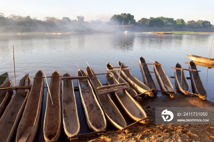 canoe on the river with mist at sunrise, Tsingy de Bemaraha National park, Madagascar