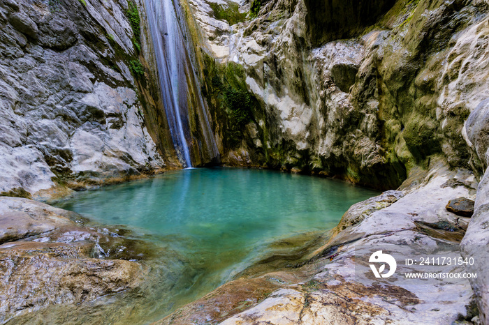 The waterfall of Nidri in Lefkada island with natural azure water pool. Greece