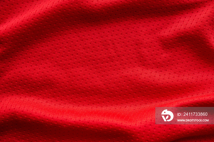 Red fabric sport clothing football jersey with air mesh texture background