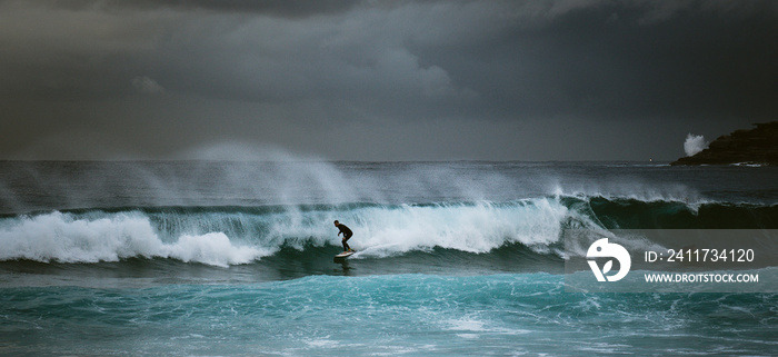 surfing the waves, silhouette surfer.