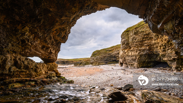Caves at Pebbled Beach, in a cove known as The Wherry, among Magnesian Limestone Cliffs just south of Souter Lighthouse which is full of caves and sea stacks