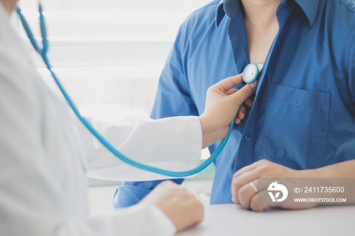 Doctor checks the heart for the patient