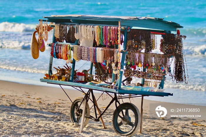 Jewelry cart on Cuban beach built on a bike