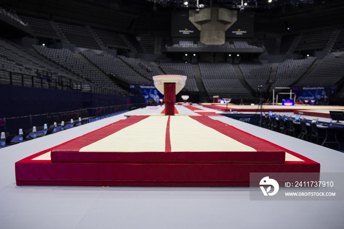 A vaulting horse in a gymnastic arena