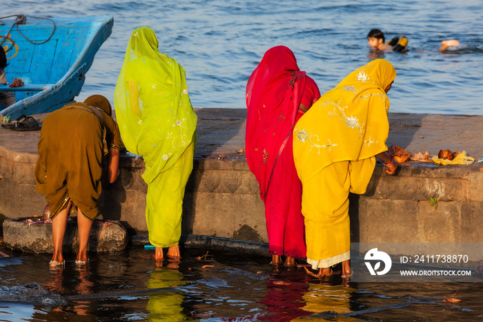 Women doing morning pooja