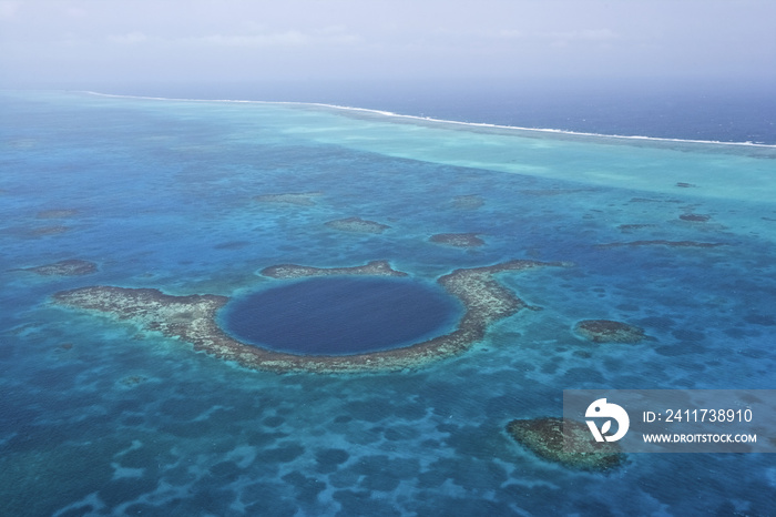 Aerial view of coral reefs and the Blue Hole, Lighthouse Atoll, Belize