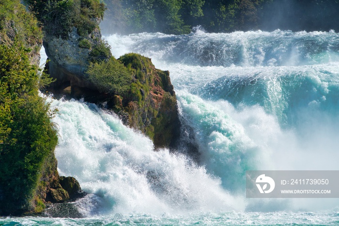 the famous rhine falls in the swiss near the city of Schaffhausen - sunny day and blue sky