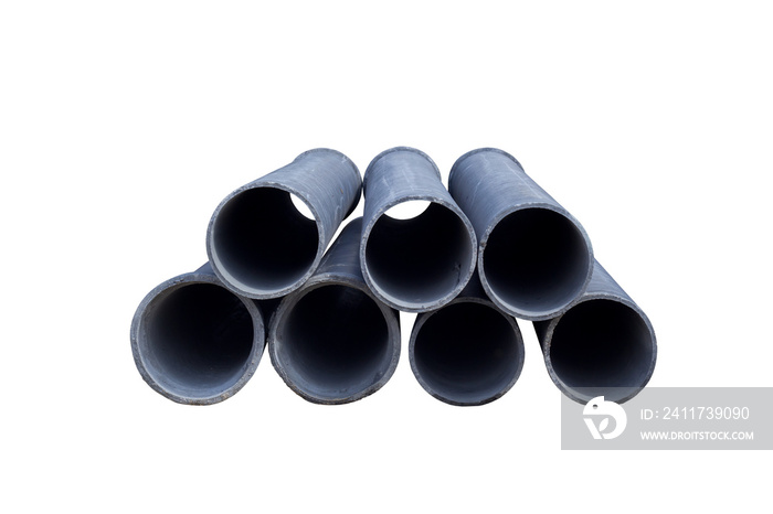 Pile of asbestos cement pipes in construction site isolated on white background included clipping path.