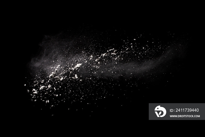 Launched white powder, isolated on black background.