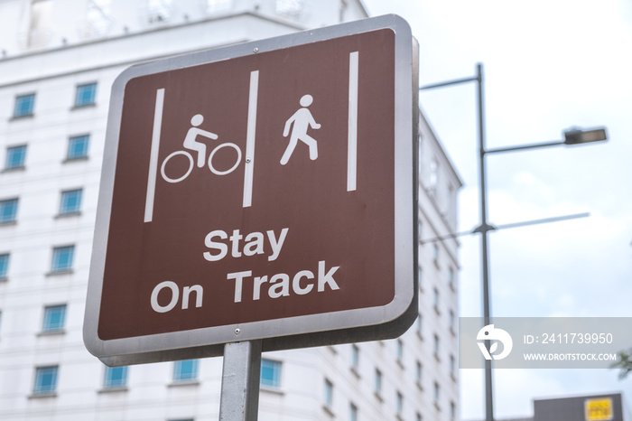 Road sign stay on track isolated