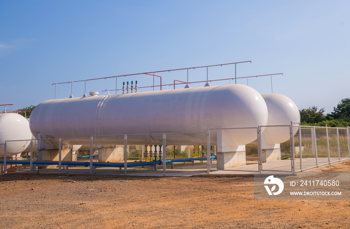 Natural Gas storage tanks in industrial plant.