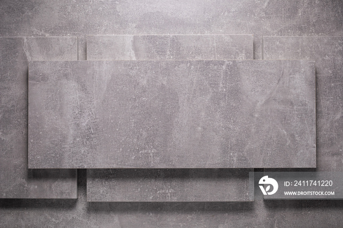 Abstract grey background texture at table or wall. Front view of gray panel plate at wall