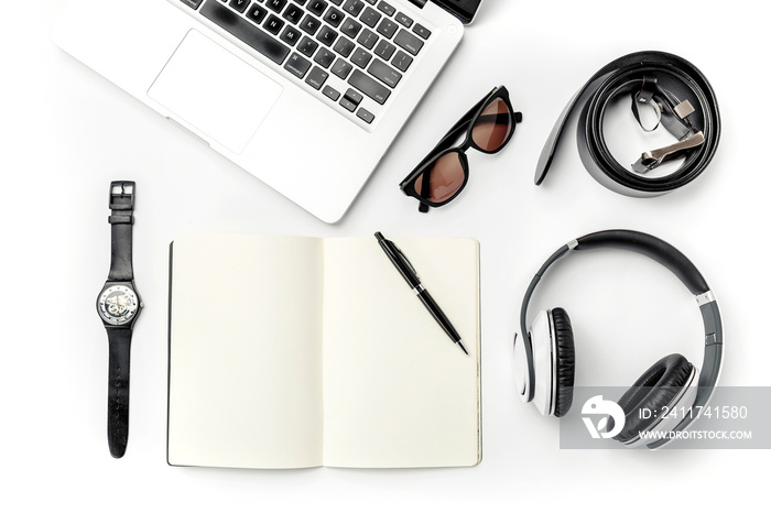 Still life of casual man. Modern male accessories and laptop on white