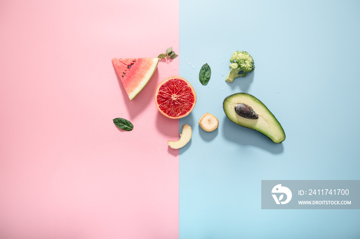 Different fruits and vegetables on a colored background.