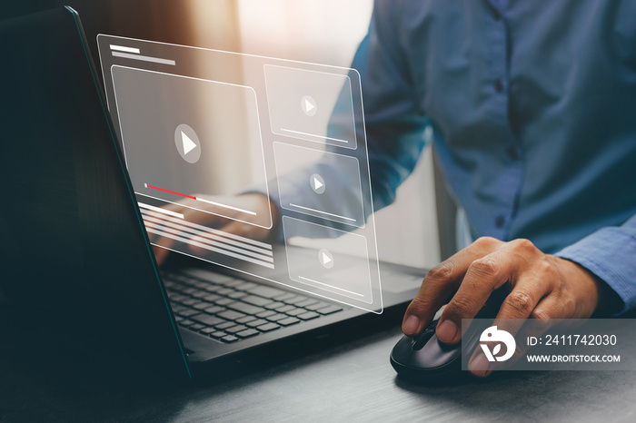 Businessman hands using laptop for streaming online, watching video on internet.